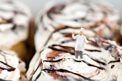 Miniature Chef on top of the Cinnamon roll