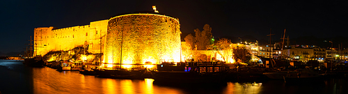 Night panorama of Kyrenia harbour with medieval castle. Cyprus