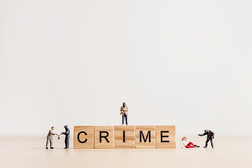 Board game letters spelling the word Crime.