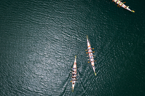 Overhead view of Dragon boat races on a lake