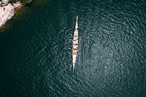 Sport dragon boat of 10 paddlers, top view