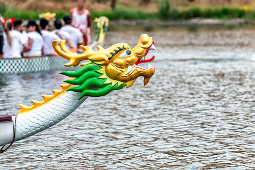 Dragon boat competition. Close-up of a boat's head