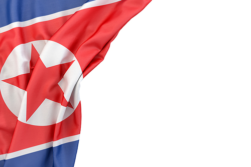 Flag of North Korea in the corner on white background. Isolated, contains clipping path