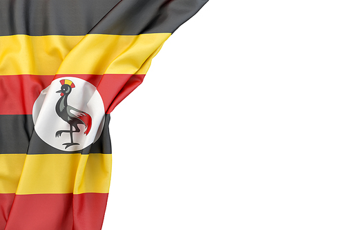 Flag of Uganda in the corner on white background. Isolated, contains clipping path