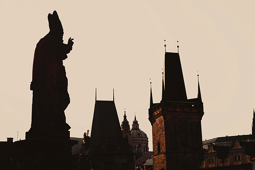 Statue silhouette at Charles bridge. Prague, Czech Republic