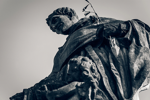 Statue of St. Nicholas of Tolentino on Charles Bridge. Prague, Czech Republic