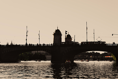 Silhouette of Legion Bridge on Vltava river. Prague, Czech Republic