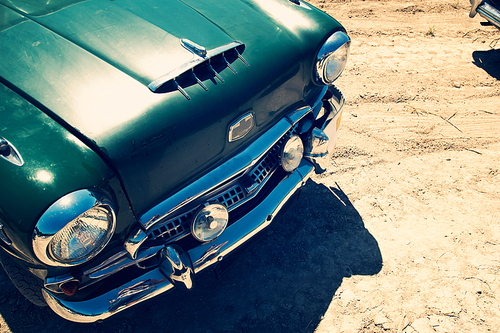 Top view of fragment of a classic vintage car. Outdoor