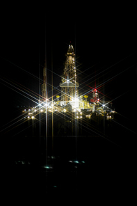 Offshore drilling rig at night