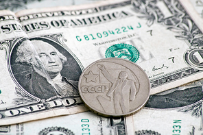 american dollar and soviet ruble close-up