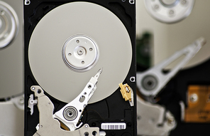 Three opened Hard drives isolated on white