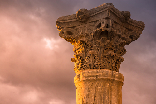 Ancient column at the Roman city of Kourion. Limassol District, Cyprus. Color tone tuned.