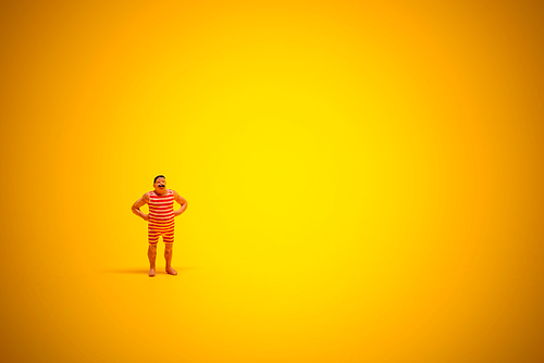 Retro swimmer with lot of yellow sunny copyspace.