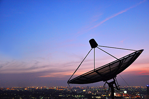 A satellite dish above the city