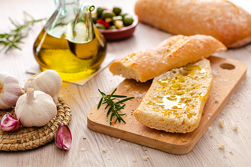 rustic bread and olive oil ready to make toasts