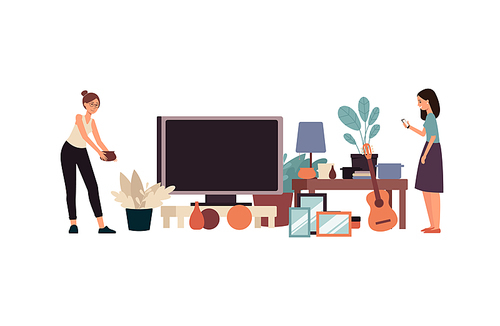 Two women, a seller and a shopper at a flea market or garage sale of things. Flea market or garage sale of tv and table, lamp and guitar, flower pots, flat cartoon isolated vector illustration.