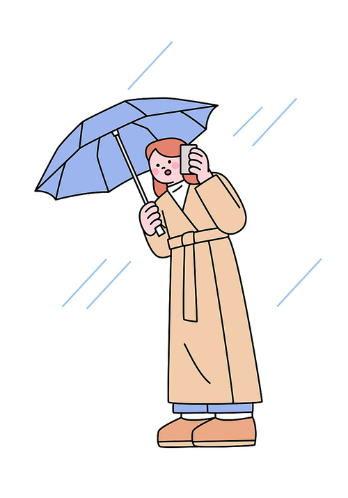 한 여성이 우산을쓰고 전화를 하고 있다.