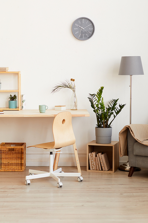 Image of domestic room with modern table chair and sofa