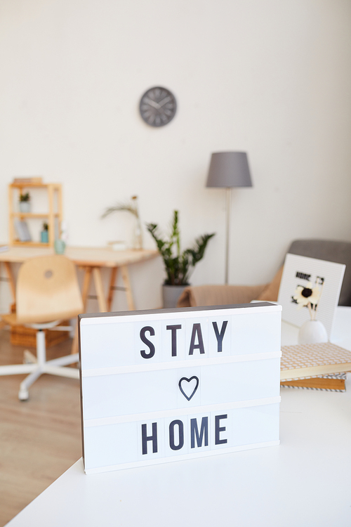 Image of poster with text Stay home in the living room at home