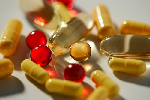 Close-up of vitamins and pills on the table for health and from the disease