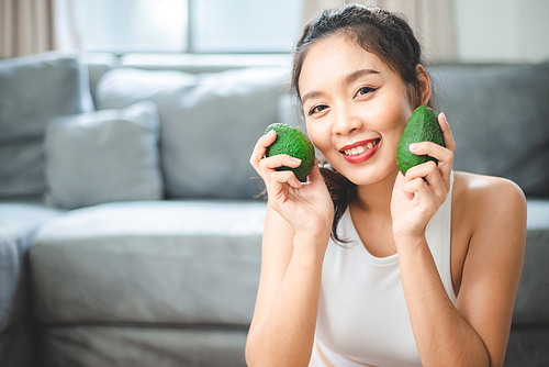 healthy clean food concept, Asian woman with fresh vegetable for diet lifestyle, happy vegetarian female girl eating organic meal at home