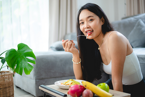 healthy clean food concept, Asian woman with fresh vegetable for diet lifestyle, happy vegetarian female girl eating organic meal at home