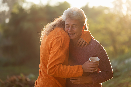 happiness female childhood family bonding mother lifestyle at nature outdoors, children daughter girl having affectionate embracing love with eltern woman, cheerful hug and smiling togetherness