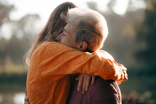 happiness female childhood family bonding mother lifestyle at nature outdoors, children daughter girl having affectionate embracing love with eltern woman, cheerful hug and smiling togetherness