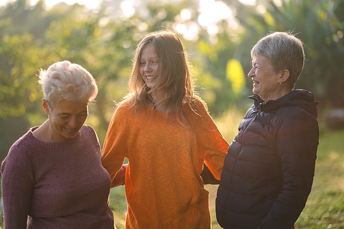 happiness female childhood family bonding mother lifestyle at nature outdoors, children daughter girl having affectionate embracing love with eltern woman, cheerful hug and smiling togetherness