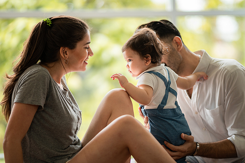 caucasian father and mother family with little baby people, cute children or newborn daughter girl childhood happy together at home with love, woman and man couple family