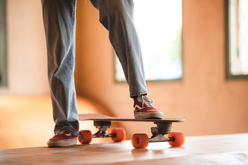 Asian women surf skate or skates board indoor beautiful summer day. Sport activity lifestyle concept