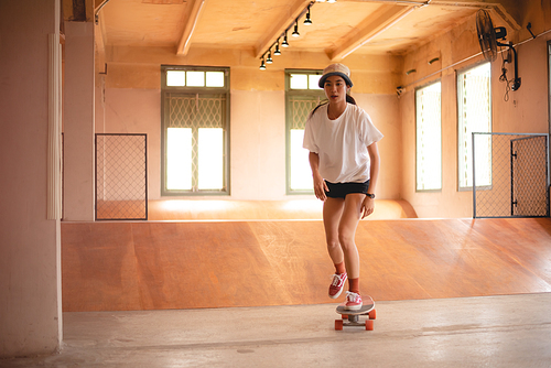 young woman person playing fun with skateboard outdoor lifestyle, skate sport concept