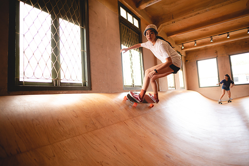 young woman person playing fun with skateboard outdoor lifestyle, skate sport concept