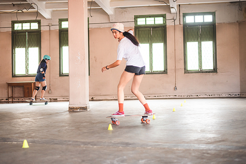 young Asian girl lifestyle, woman having fun with skate sport, skateboard fashion style