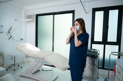 young woman patient with a therapy treatment of cosmetic face skin, surgery medicine concept