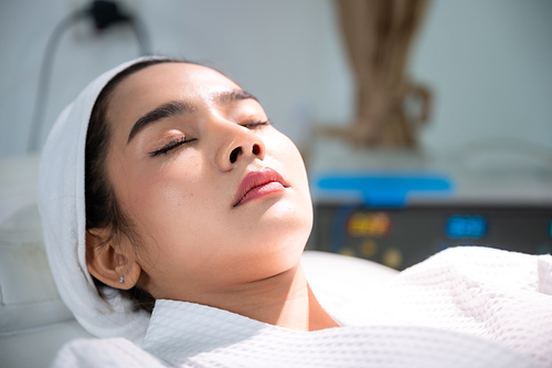 young Asian woman making cosmetology treatment skin injection, Mesotherapy of face beauty care