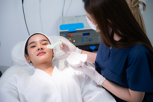 young Asian woman making cosmetology treatment skin injection, Mesotherapy of face beauty care