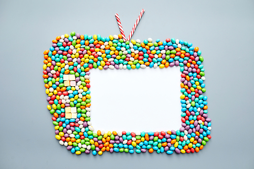 Old-fashioned television set made of candies such as jellybeans, candy canes, marshmallows